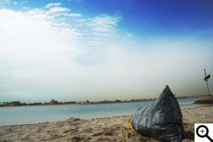 Trash bag left in the beaches